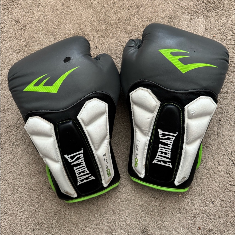 Everlast Pro Boxing Gloves in Gray and White with Green Accents , 14-Ounce used.